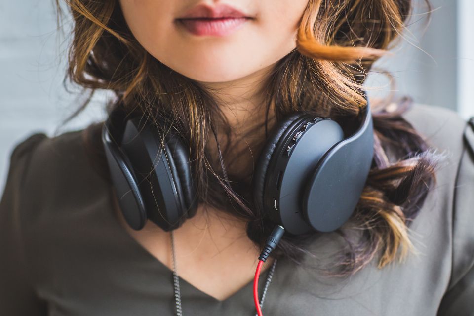 A student wearing over-ear headphones